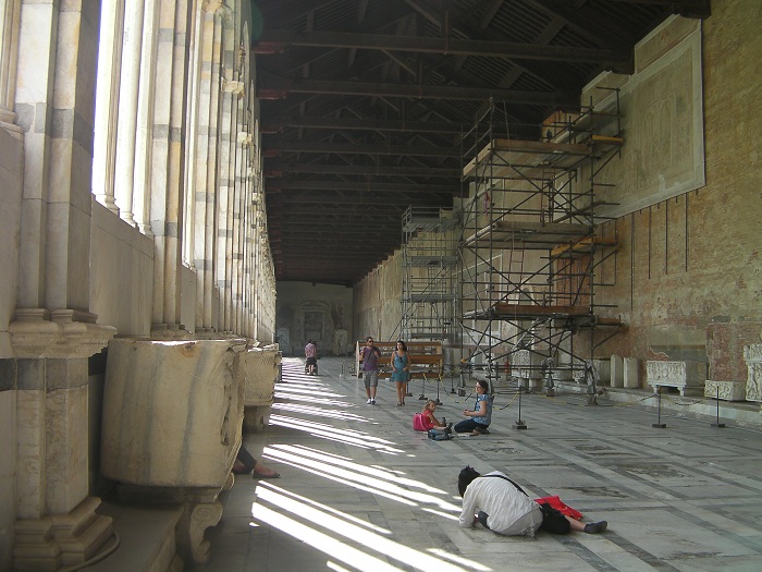 Interior hallway of Campo Santo showing restoration work of some of the murals